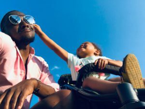 baby approaching men s black sunglasses